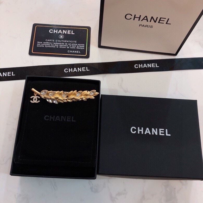 Ch*el brooches